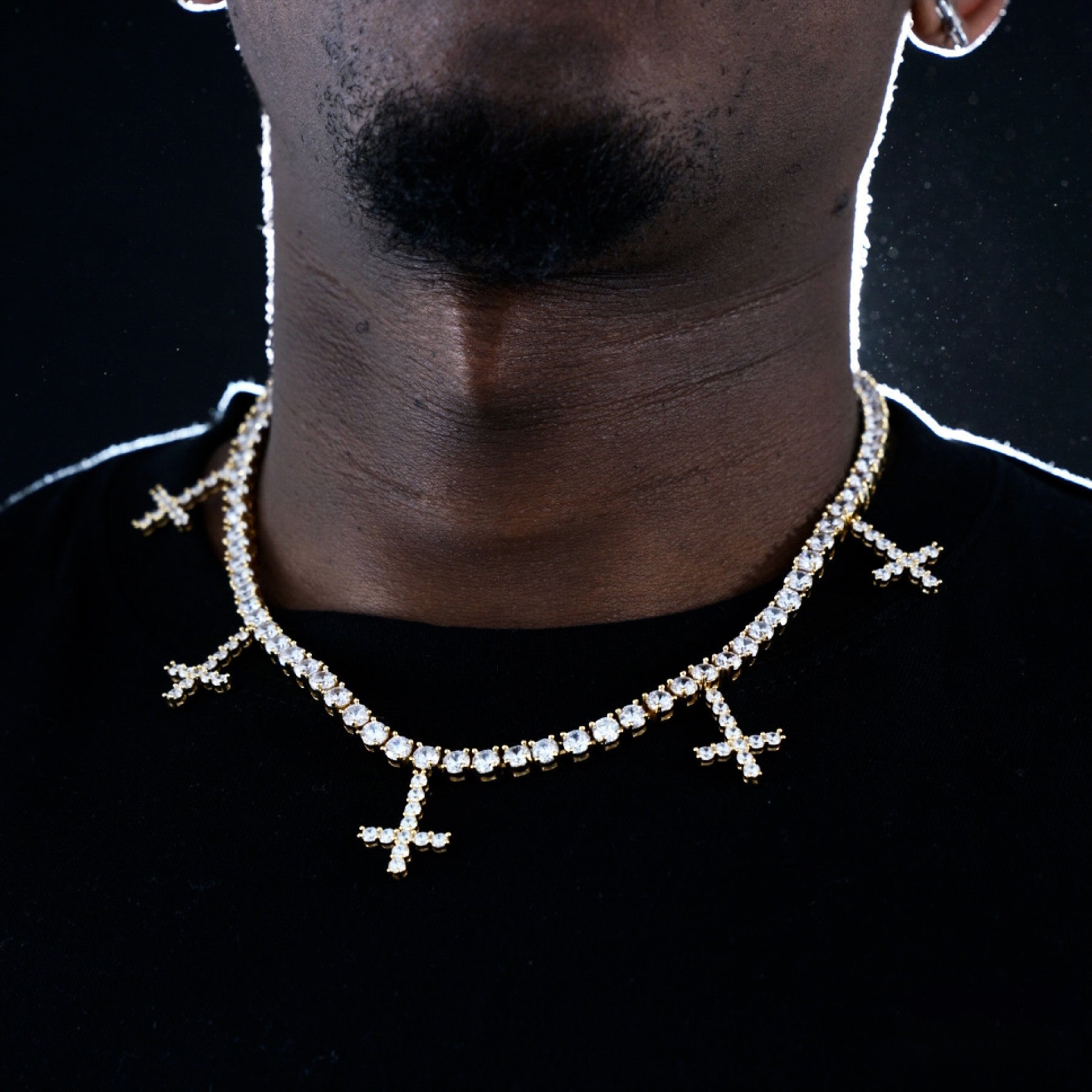 Iced out store upside down cross